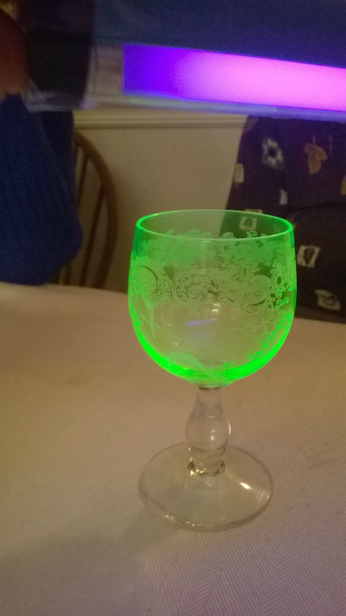 glassware from 1911 that is made with uranium. When exposed to UV light, it glows green