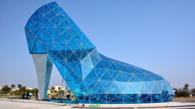 A 16m-high (55ft) glass church in the shape of a high-heeled shoe has been built in Taiwan